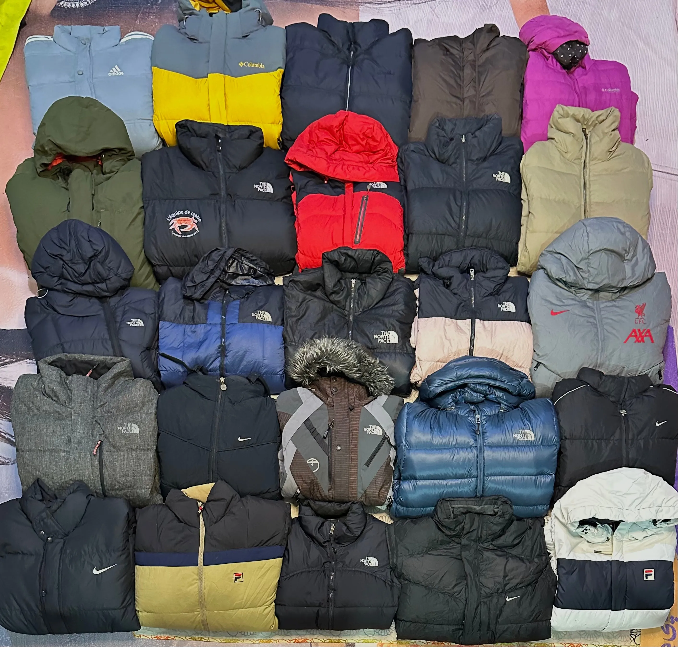 Mix branded puffer jackets